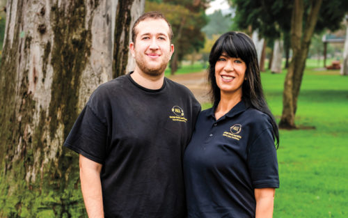 All Garage Doors and Gates Owners standing together in a park