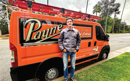 Owner Daniel Payne stands in front of his truck.